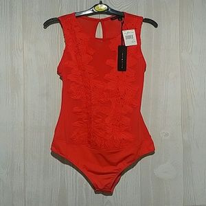 Red sleeveless bodysuit top with textured print
